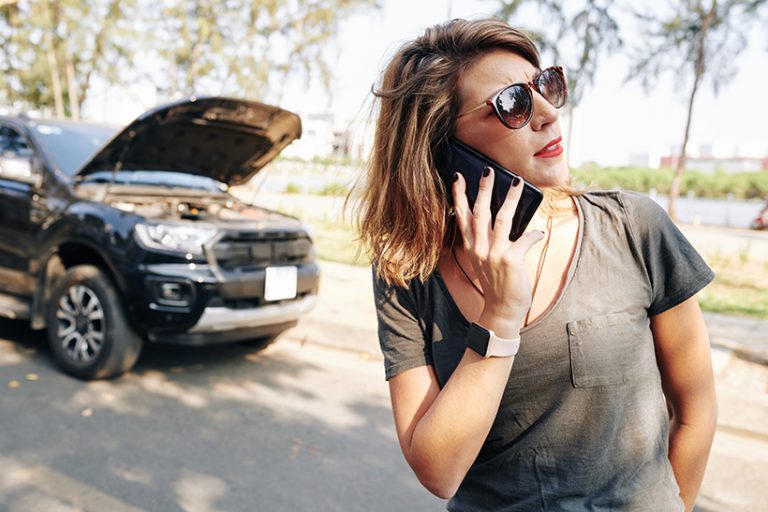 Woman calling to car insurance Women Daily Magazine